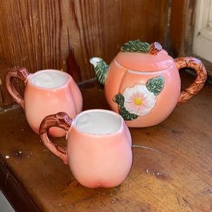 Vintage peach tea cups and tea pot